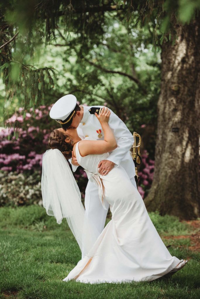 Groom dipping bride at their Portage Country Club Wedding