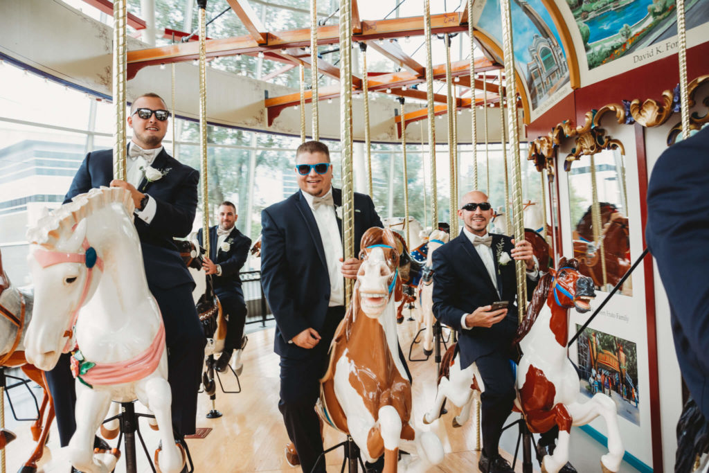 bridal party riding carousel at Cleveland History Center