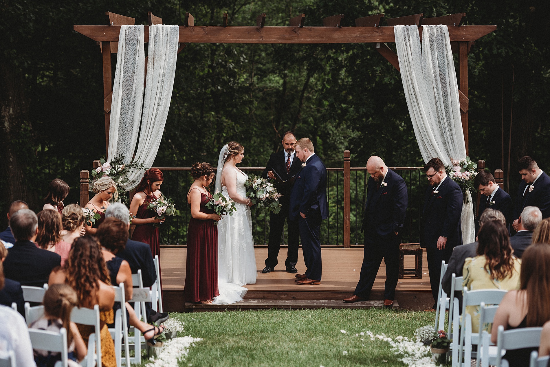 Outdoor wedding ceremony at century farms in Ohio  one of The Top 14 Barn Wedding Venues in Ohio