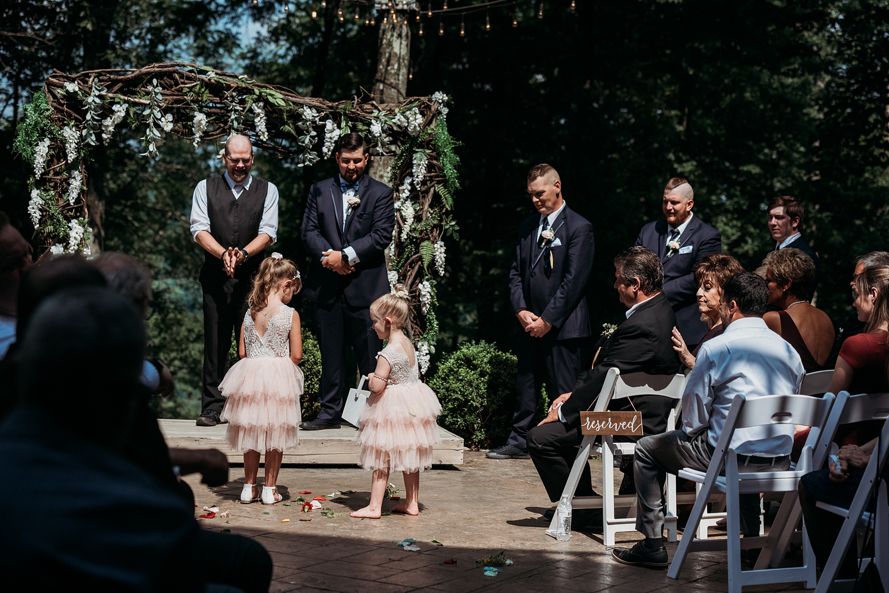 flower girls at Beautiful outdoor Summer Wedding ceremony at The Grand Barn at the Mohicans