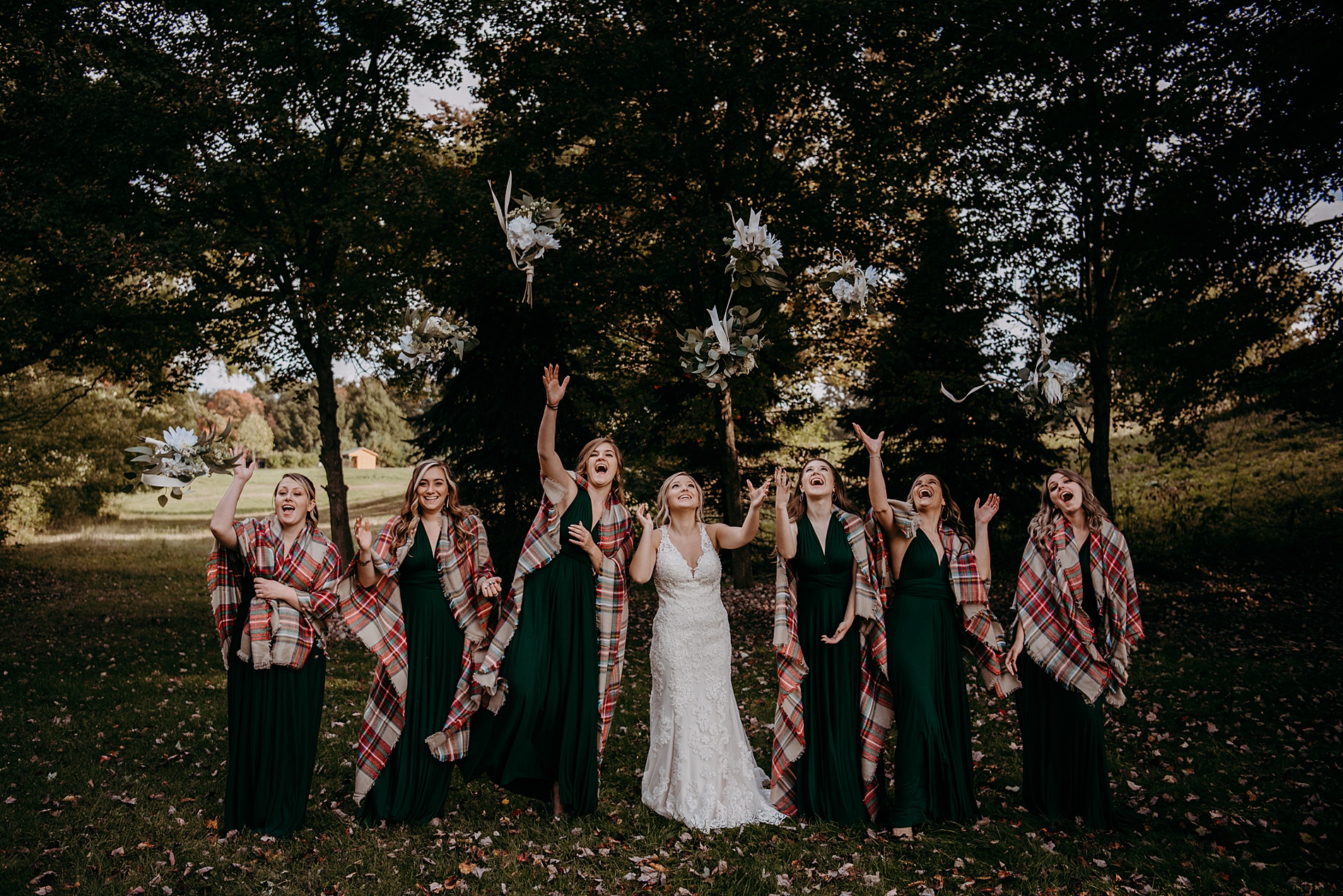 bride celebrates with bridesmaids at  one of The Top 14 Barn Wedding Venues in Ohio